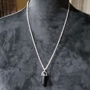 Silver necklace with black pendant